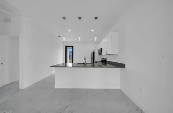a view of kitchen with counter top