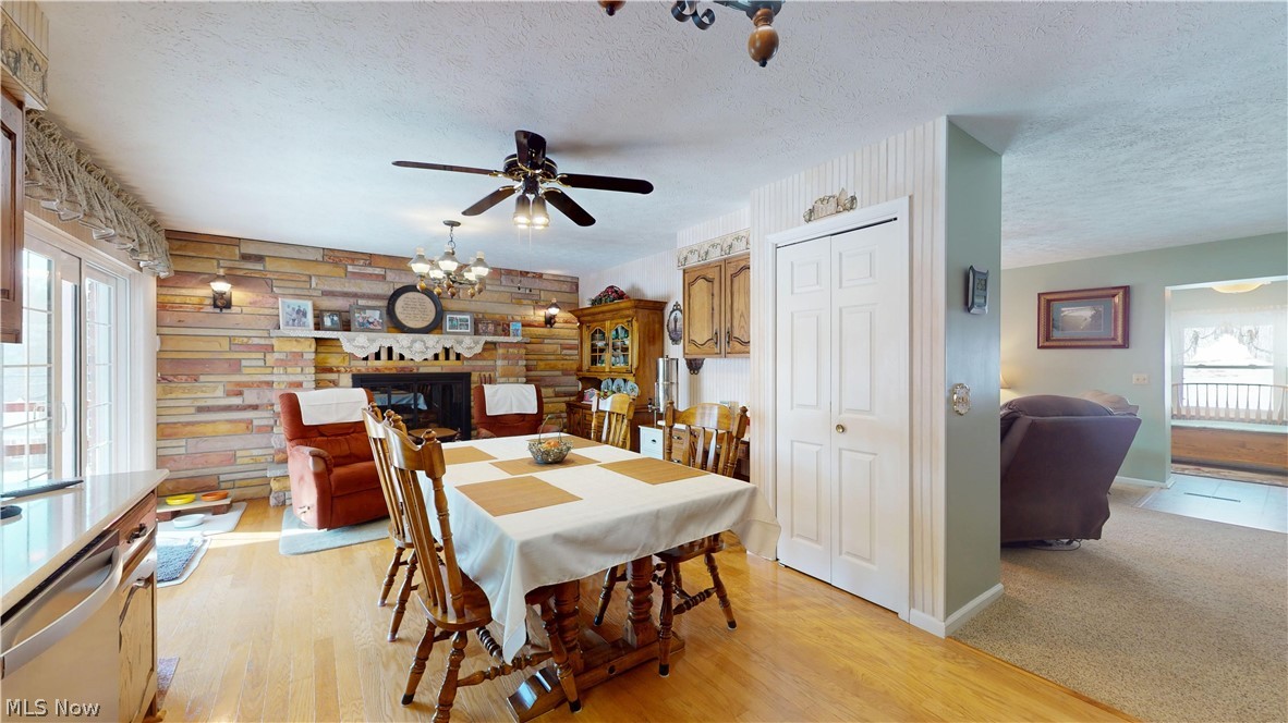 976 Braun Road Belpre, OH 45714 - Photo 16 of 48 DINING TABLE CAN BE MOVED OVER TO WHERE THE CHAIRS ARE FOR PROPER PLACEMENT