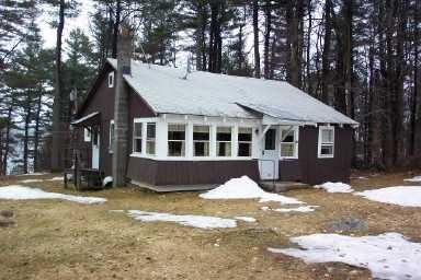 237 Pine Road Otis, MA 01029 - Photo 1 of 1 a view of a house with a yard covered in snow