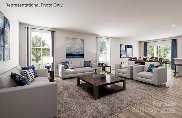 a living room with furniture and windows