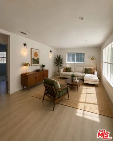 a living room with furniture and a couch