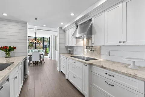 a view of a swimming pool with a lounge chair