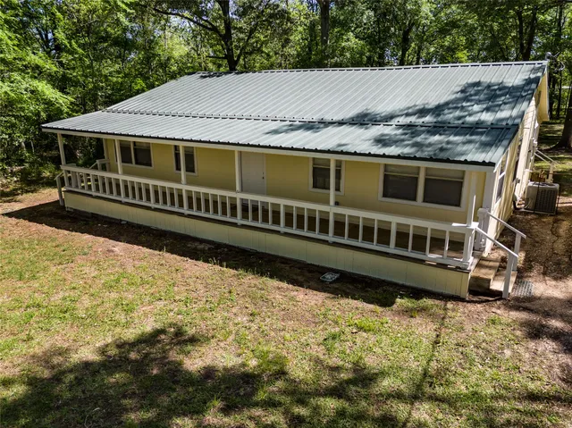 a view of a house with a roof deck