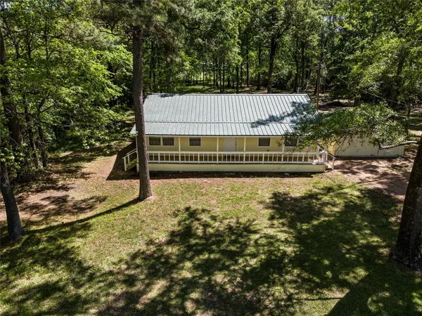 a view of backyard with green space