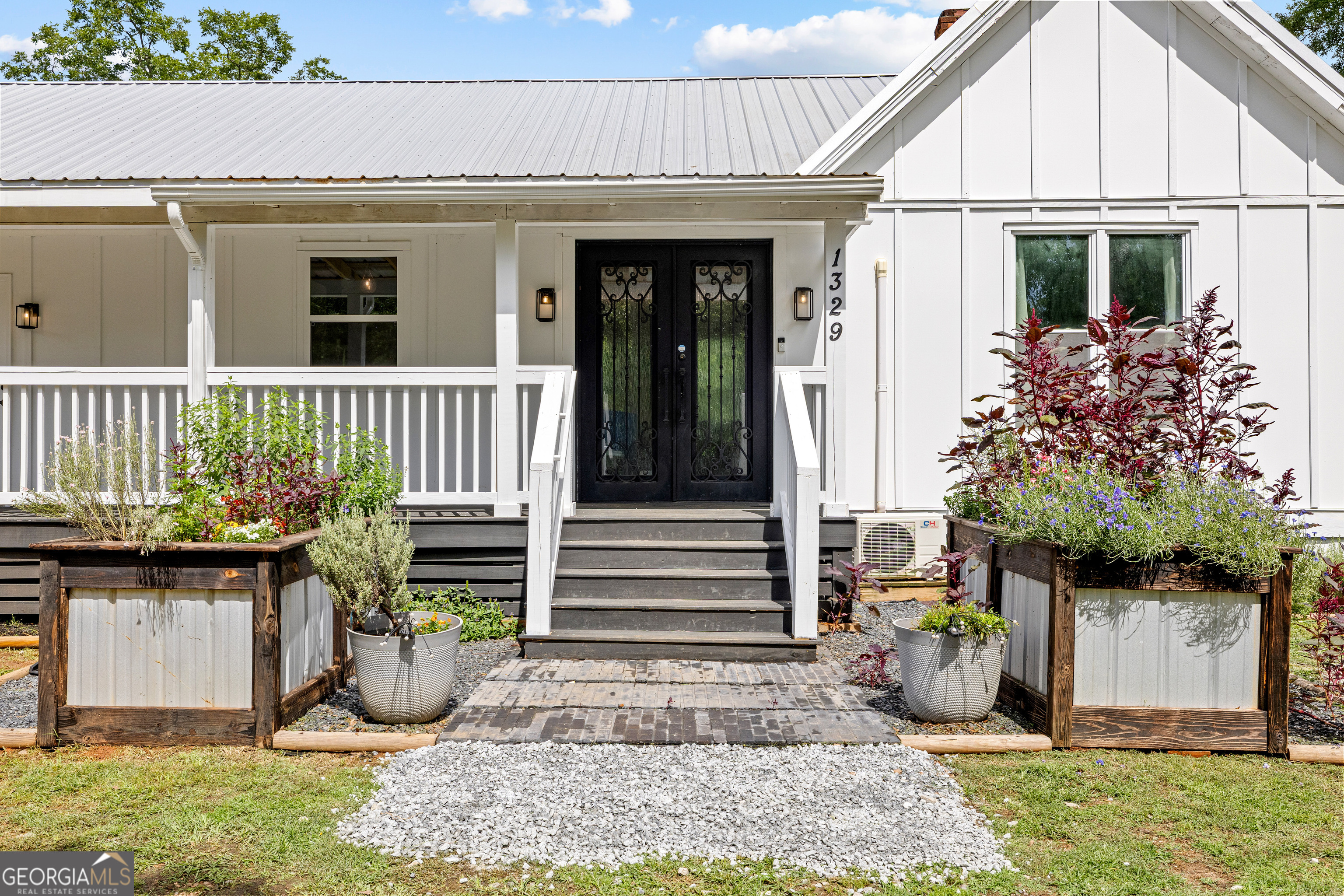 1329 Standing Rock Road Senoia, GA 30276 - Photo 1 of 77 a view of a house with a yard and sitting area