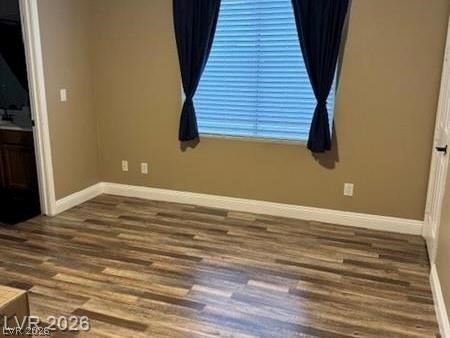 7524 Midnight Rambler Street Las Vegas, NV 89149 - Photo 33 of 51 Natural wood-look flooring and ample wall space characterize this versatile interior room.