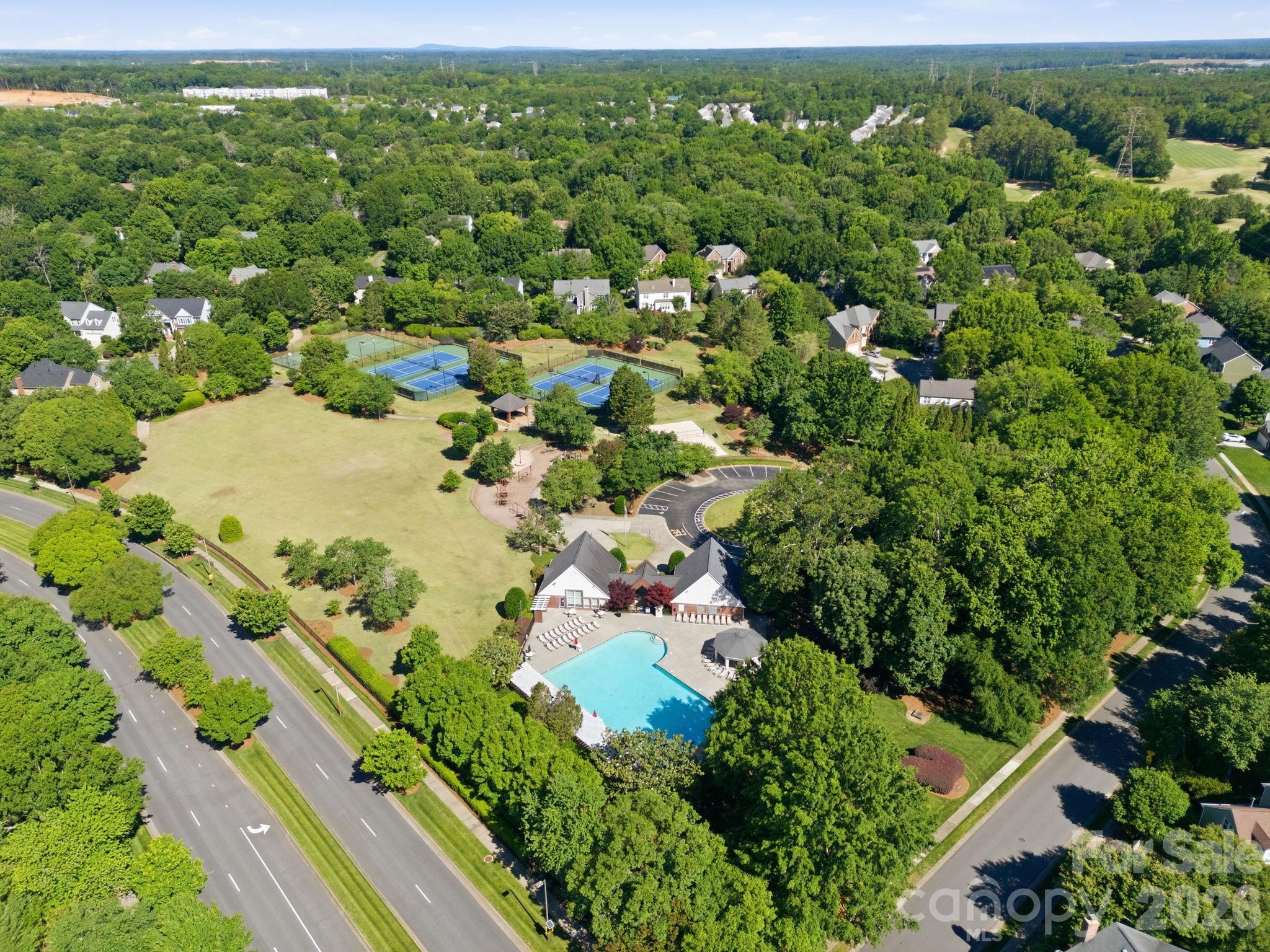 3308 Grandeur Road Charlotte, NC 28269 - Photo 44 of 45 view of a green field with lots of bushes