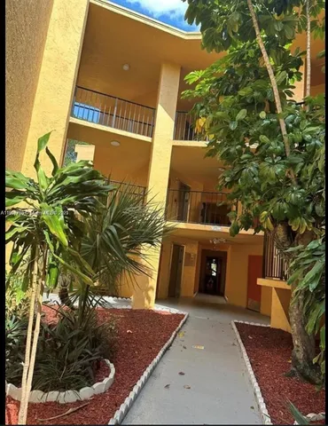 a view of a potted plants in front of building