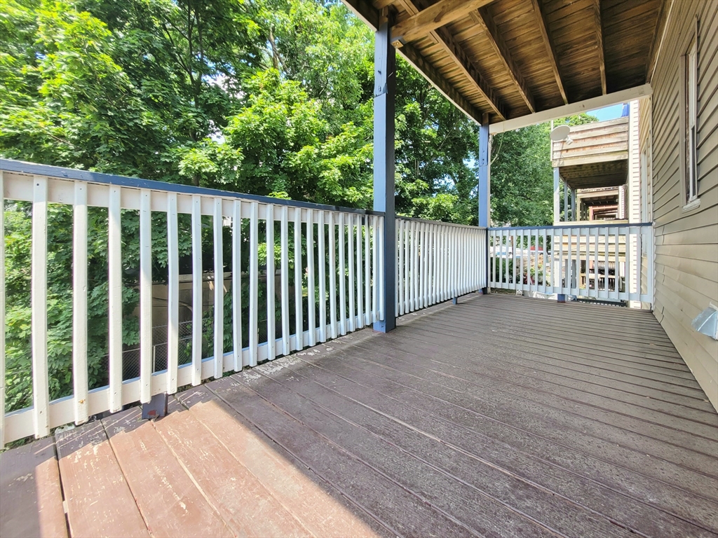 35 Dunlap Street, Unit 2 Boston, MA 02124 - Photo 12 of 12 a view of a balcony with wooden floor