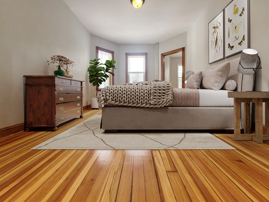35 Dunlap Street, Unit 2 Boston, MA 02124 - Photo 6 of 12 a living room with furniture and wooden floor