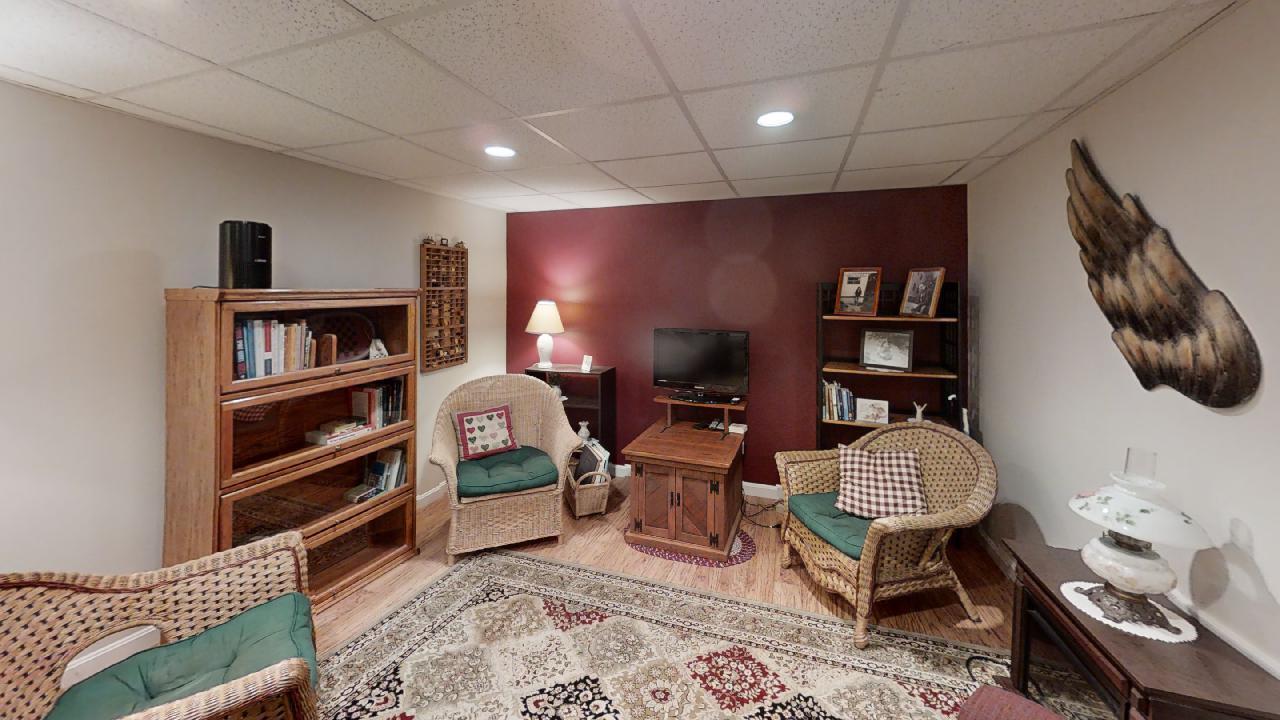 59 Route 6A, Unit 323 Orleans, MA 02653 - Photo 14 of 23 a living room with furniture