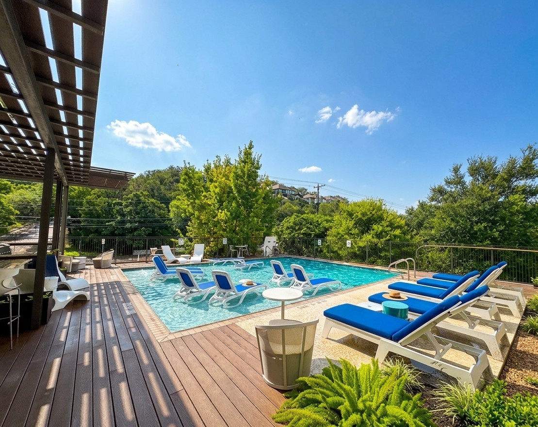1900 Barton Springs Road, Unit 3036 Austin, TX 78704 - Photo 10 of 19 Lounge poolside on the expansive deck, enjoying tranquil water and abundant greenery overlooking Barton Springs .