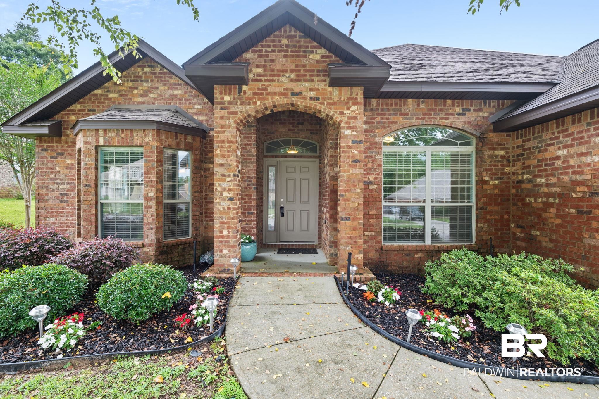 2554 Masters Court Mobile, AL 36618 - Photo 2 of 35 Property entrance featuring brick siding and a shingled roof