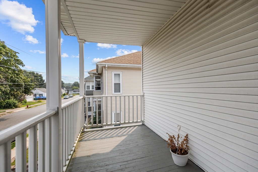 97 Warwick Street Woonsocket, RI 02895 - Photo 21 of 40 a view of a porch with furniture