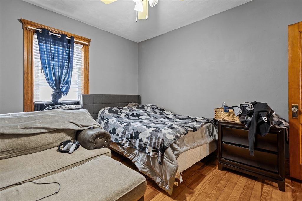 97 Warwick Street Woonsocket, RI 02895 - Photo 35 of 40 a bedroom with a bed and a window