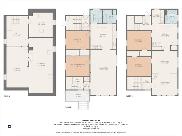 a picture of a kitchen with refrigerator and mirror