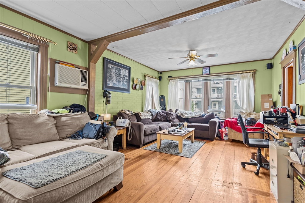 97 Warwick Street Woonsocket, RI 02895 - Photo 7 of 40 a living room with furniture and a large window