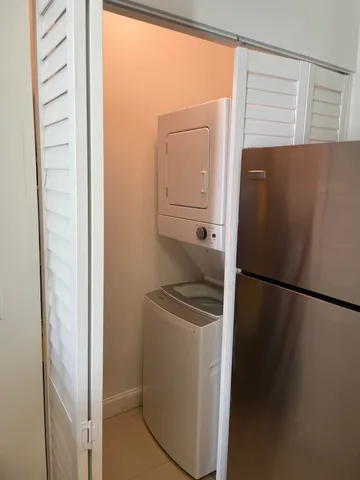 a utility room with washer and dryer