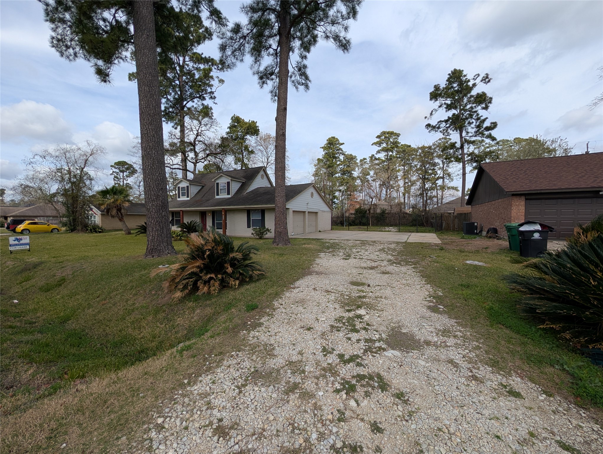 515 Broad Ripple Drive Huffman, TX 77336 - Photo 14 of 21 a view of a house with a yard and sitting area