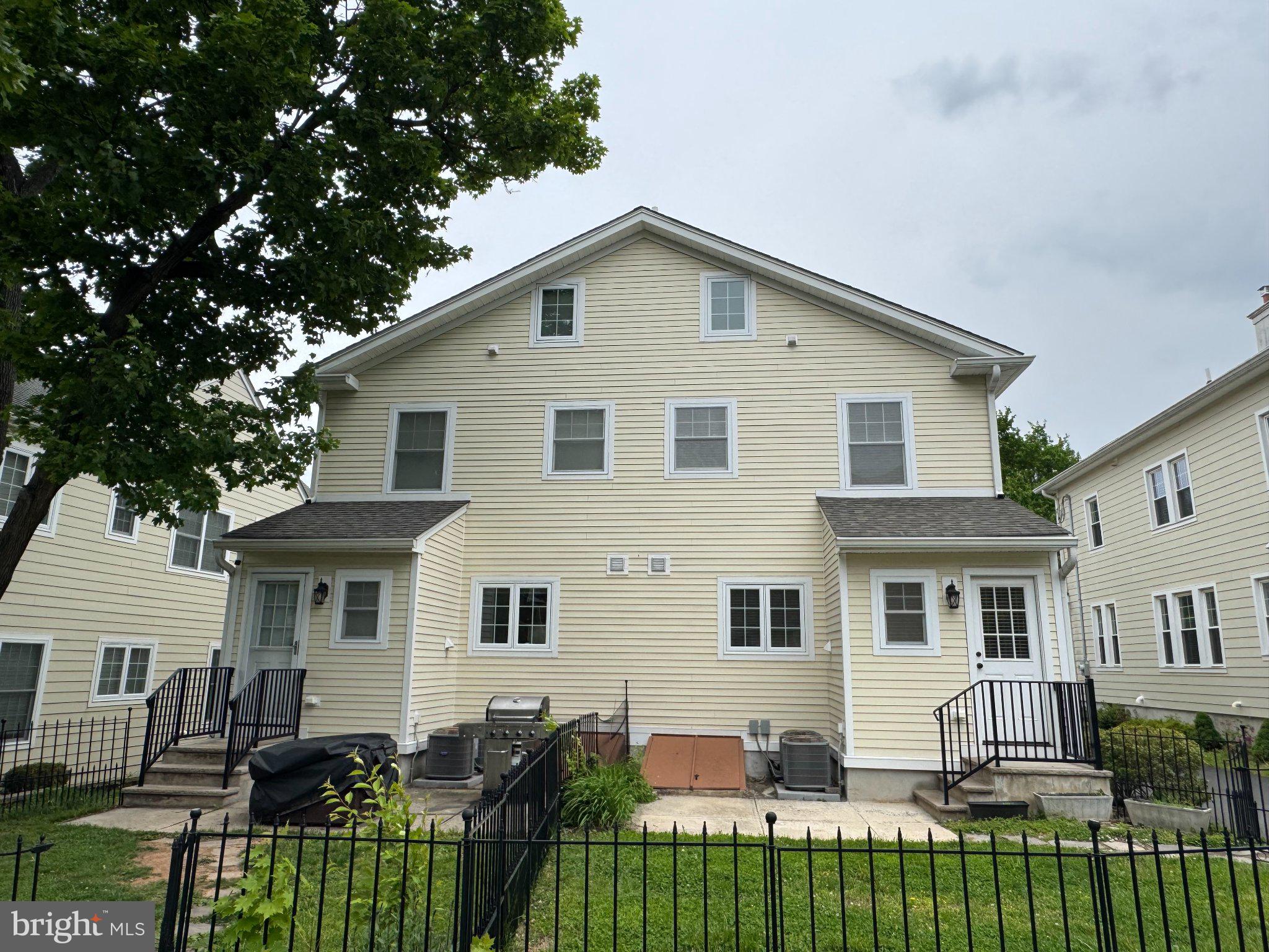 Charming duplex with inviting curb appeal.