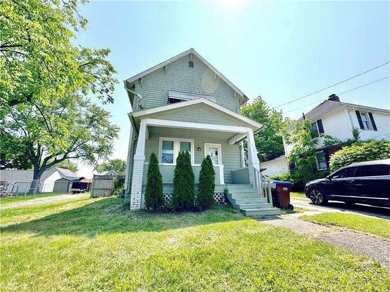 805 Stambaugh Avenue Sharon, PA 16146 - Photo 1 of 17 a front view of a house with a yard