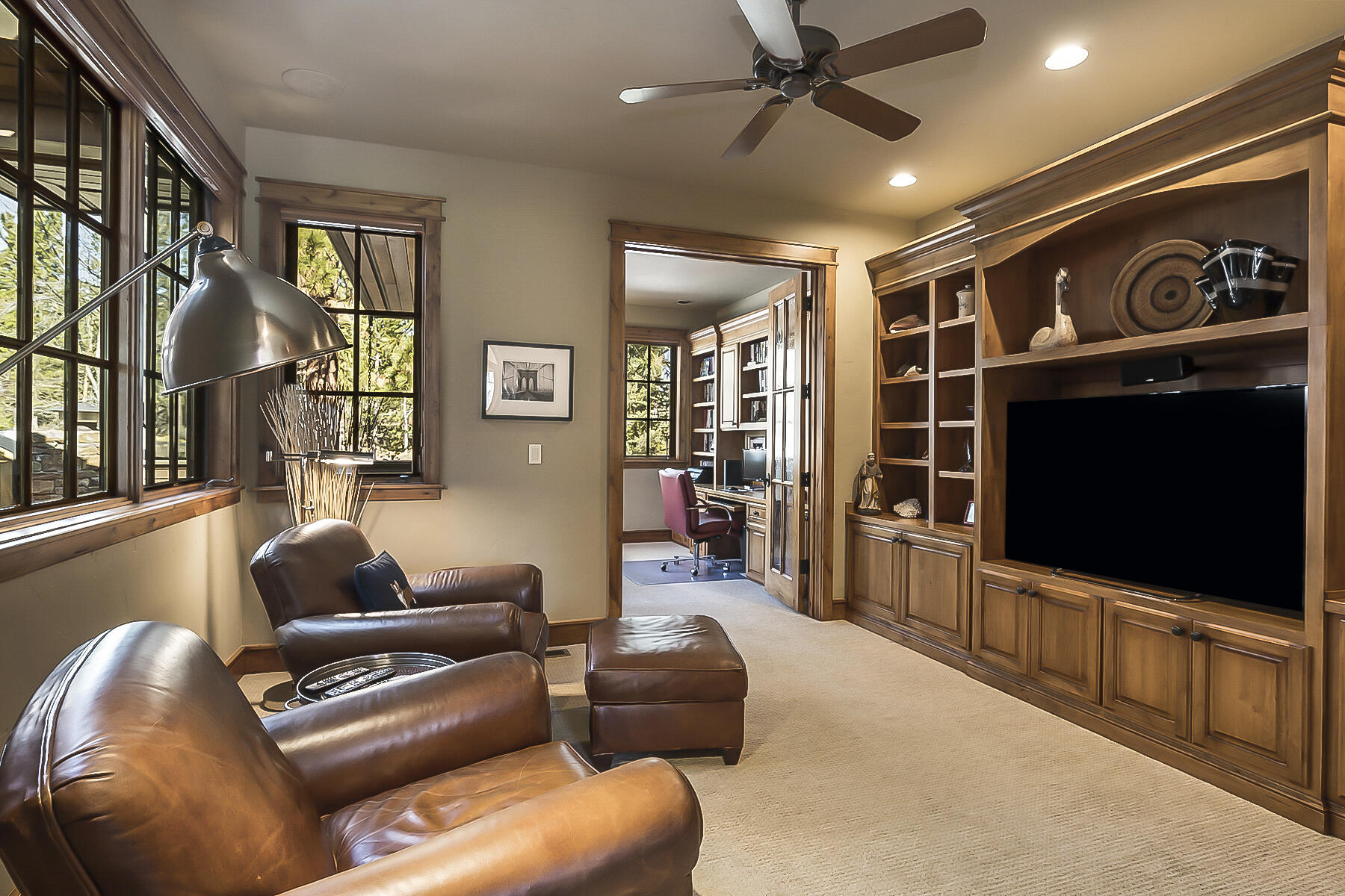 19436 Green Lakes Loop Bend, OR 97702 - Photo 30 of 53 Cozy den if the perfect place to relax or watch TV. Features built-in media center with book shelves.
