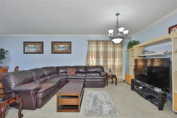 a kitchen with stainless steel appliances granite countertop wooden cabinets a stove a sink and dishwasher