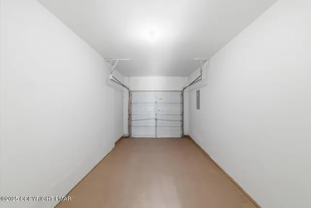 a view of a hallway with windows