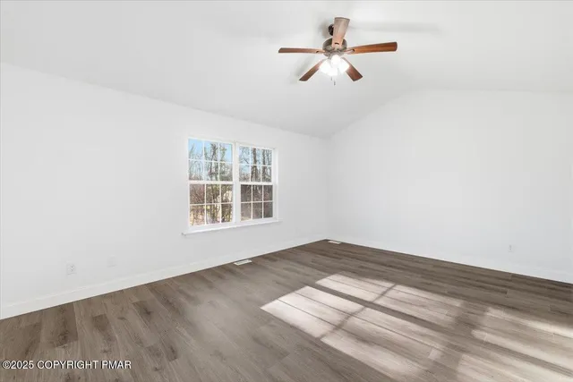 a bathroom with a sink vanity and a mirror