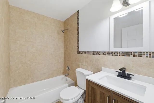 a view of a room that has wooden floor in it