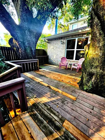 a view of a backyard with a sitting area