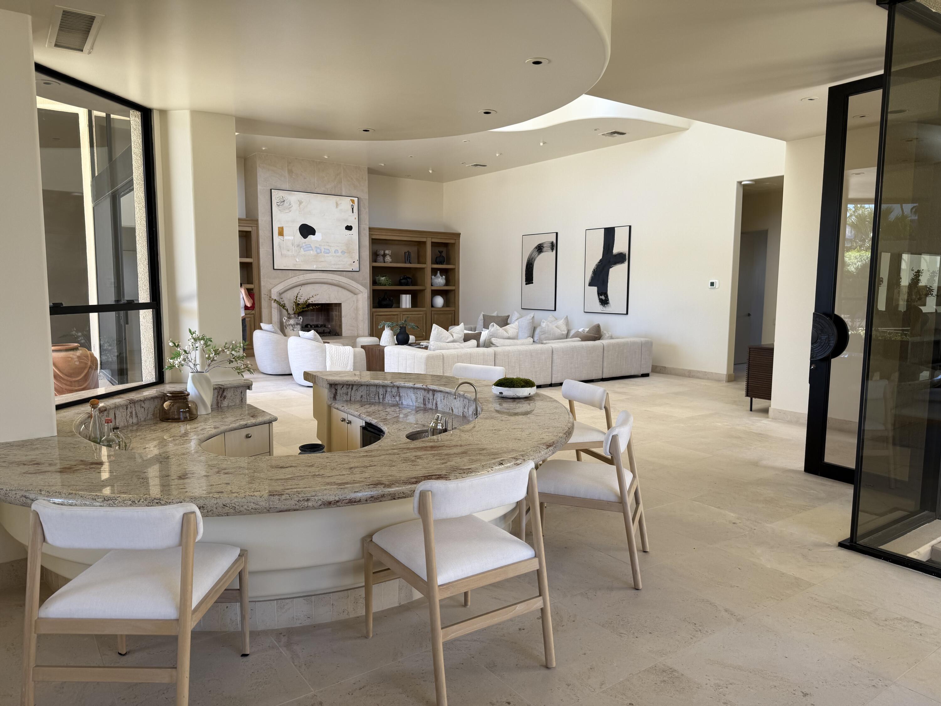 23 Stephen Terrace Rancho Mirage, CA 92270 - Photo 103 of 104 a dining room with furniture and a large window