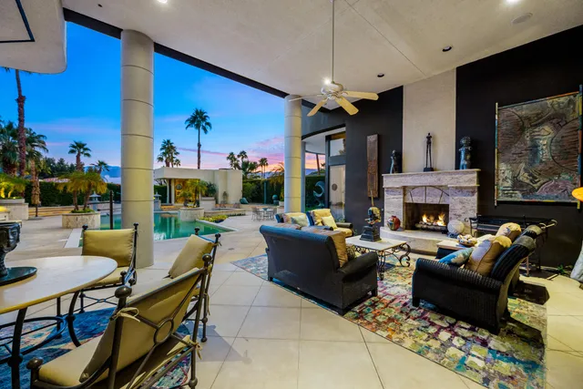 a view of a swimming pool with a patio