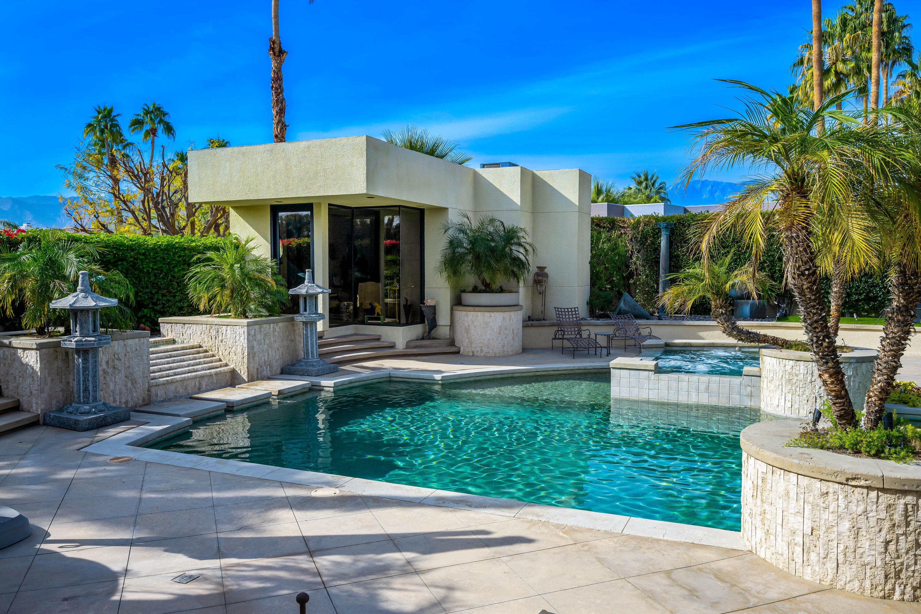 23 Stephen Terrace Rancho Mirage, CA 92270 - Photo 42 of 104 a front view of a house with garden