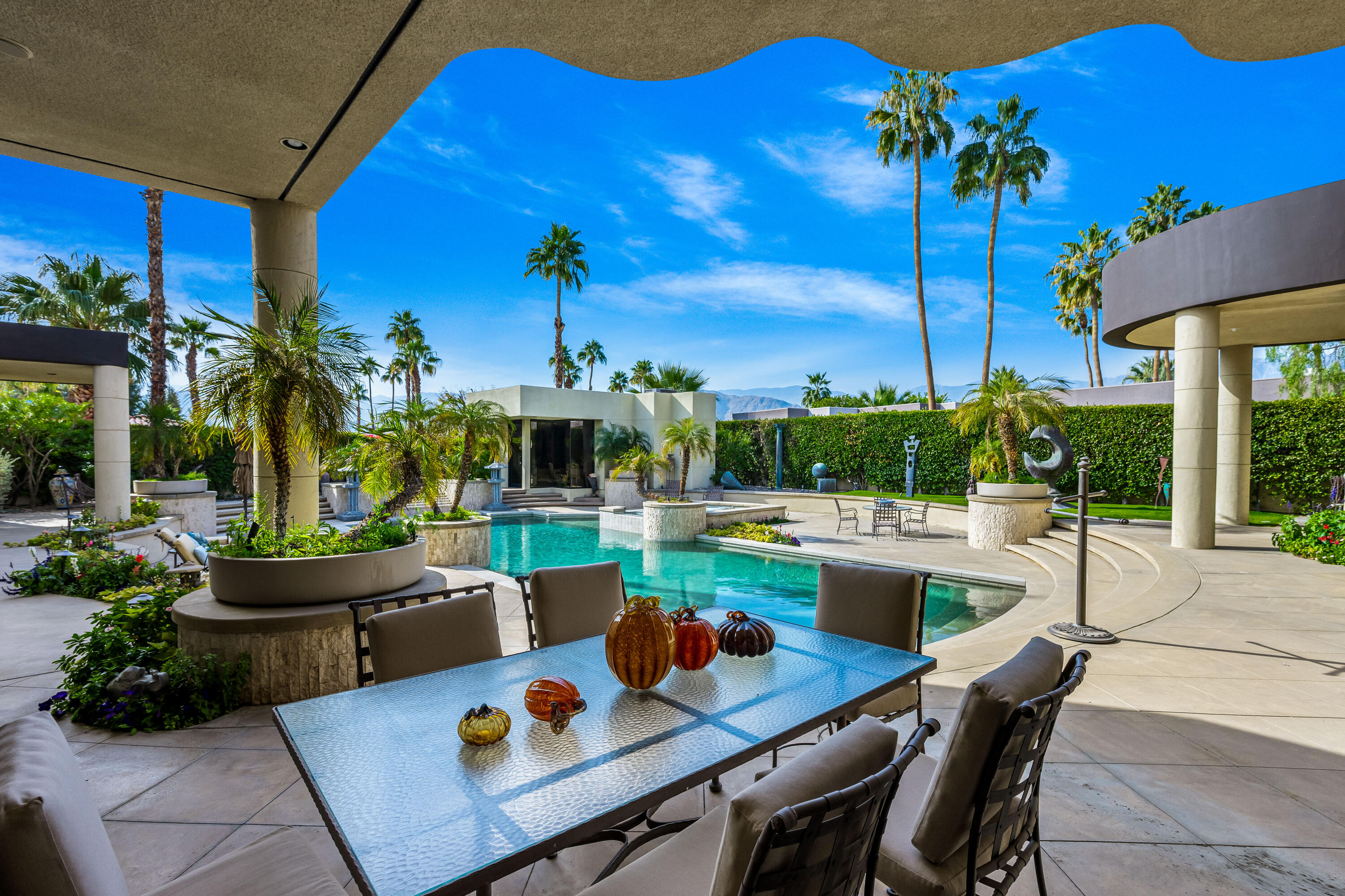23 Stephen Terrace Rancho Mirage, CA 92270 - Photo 60 of 104 a view of a dining table and chairs in a patio