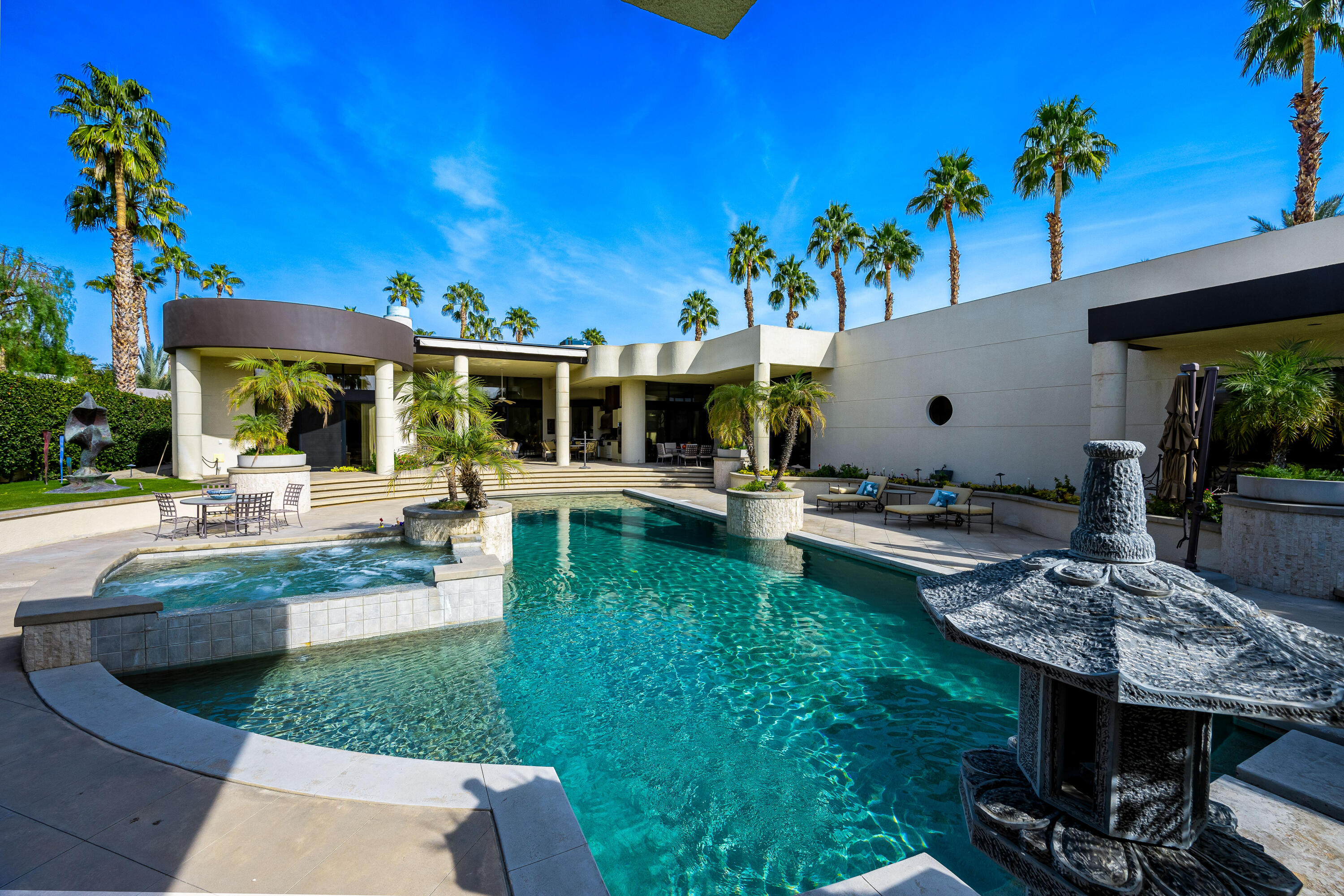 23 Stephen Terrace Rancho Mirage, CA 92270 - Photo 74 of 104 a view of a house with backyard porch and sitting area