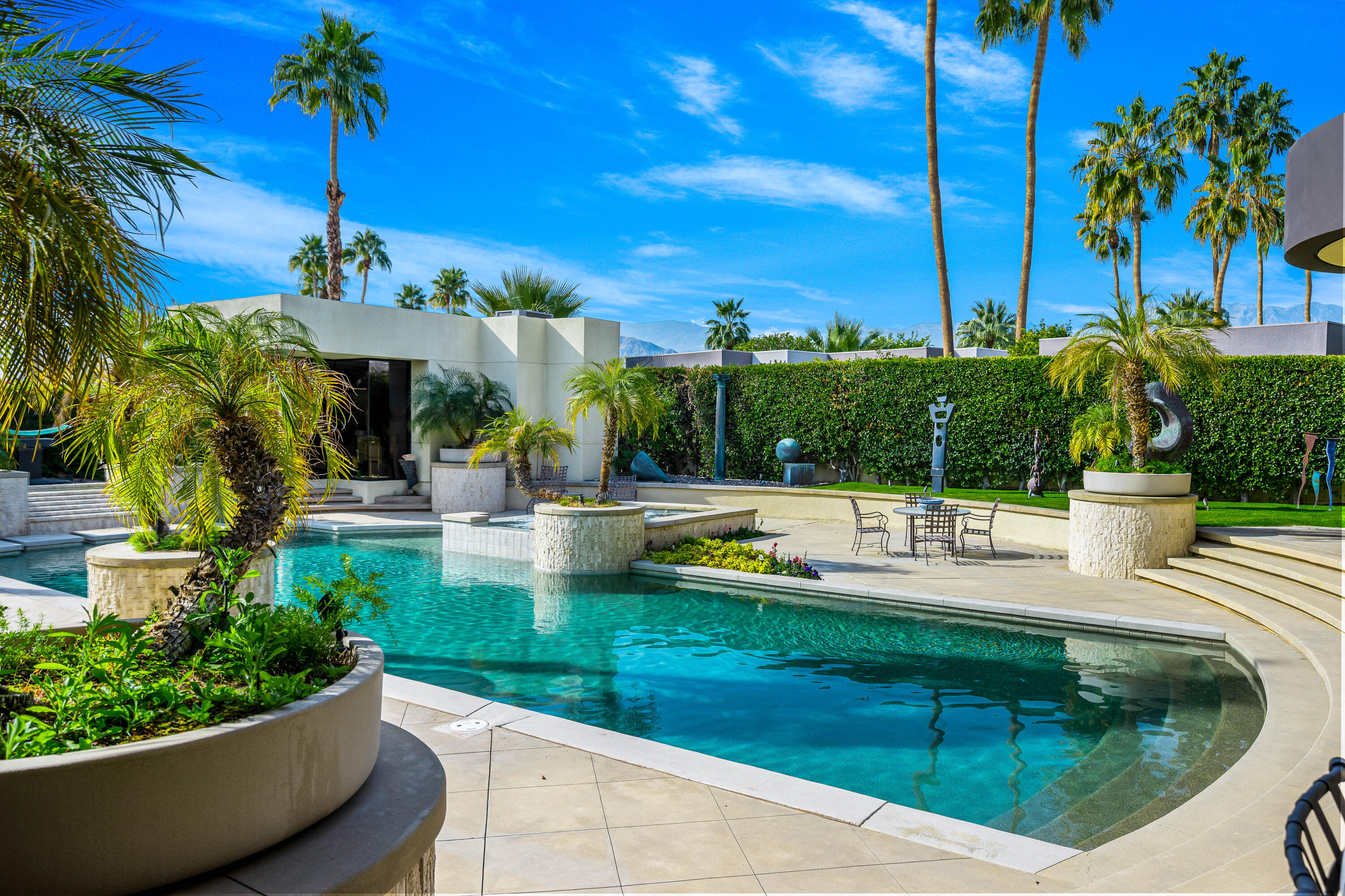 23 Stephen Terrace Rancho Mirage, CA 92270 - Photo 75 of 104 a view of a swimming pool with a patio