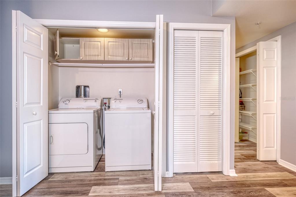 960 Starkey Road, Unit 1502 Largo, FL 33771 - Photo 23 of 36 a utility room with dryer and washer