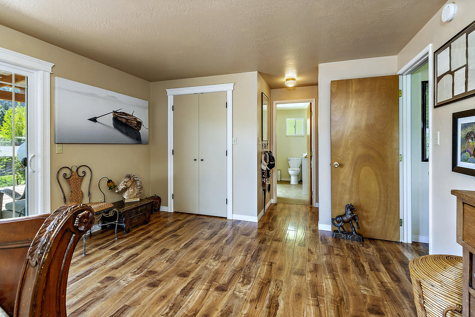855 Holton Road Talent, OR 97540 - Photo 28 of 78 a bedroom with a bed and a walk in closet