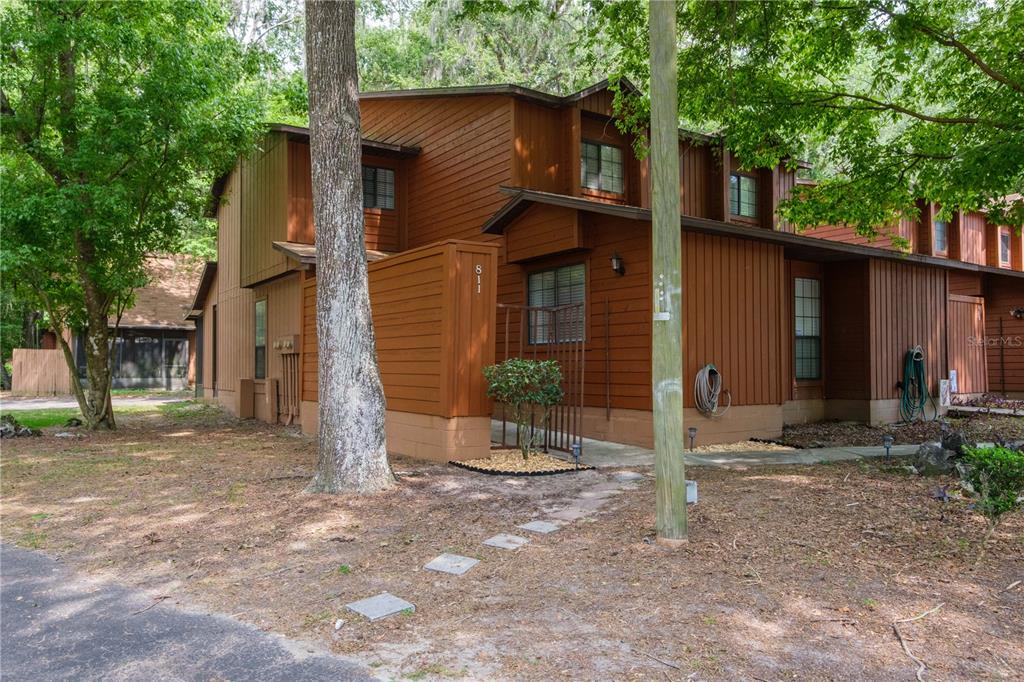 811 Southwest 56th Terrace Gainesville, FL 32607 - Photo 1 of 1 a view of a house with a tree in the background