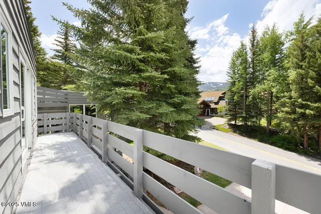a view of a balcony with an outdoor space