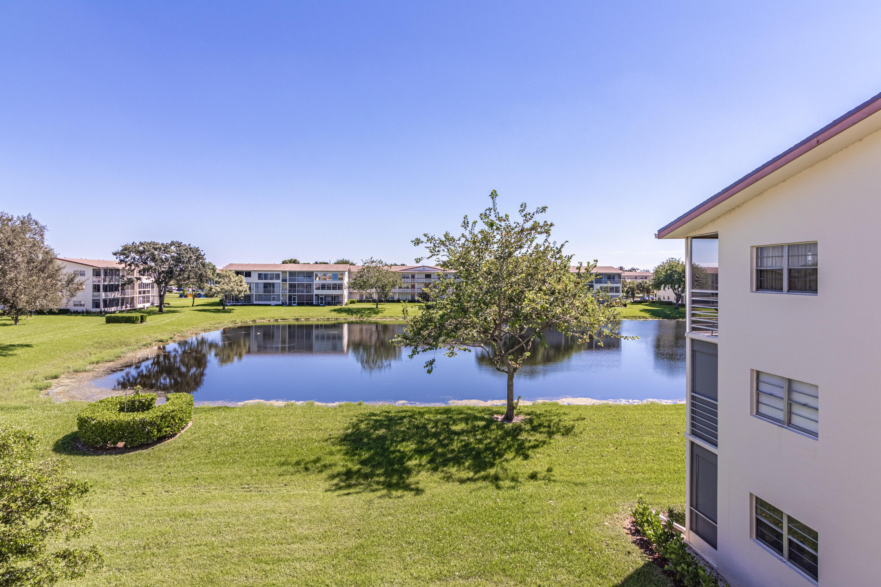34 Suffolk Way Boca Raton, FL 33434 - Photo 18 of 19 Calming lake view! WOW!