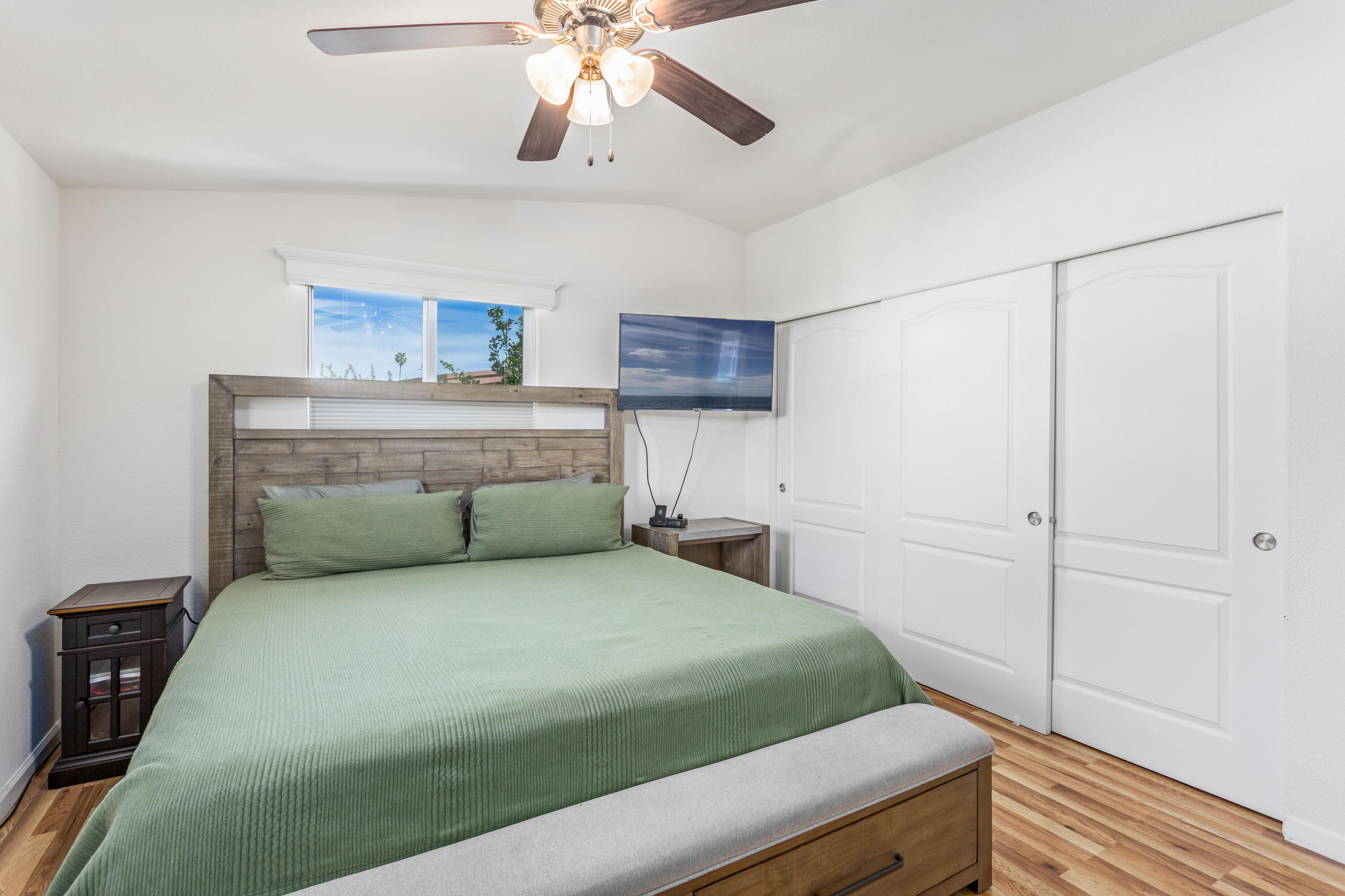 333 Old Mill Road, Unit SPC 66 Santa Barbara, CA 93110 - Photo 13 of 33 a bedroom with a bed and a chandelier