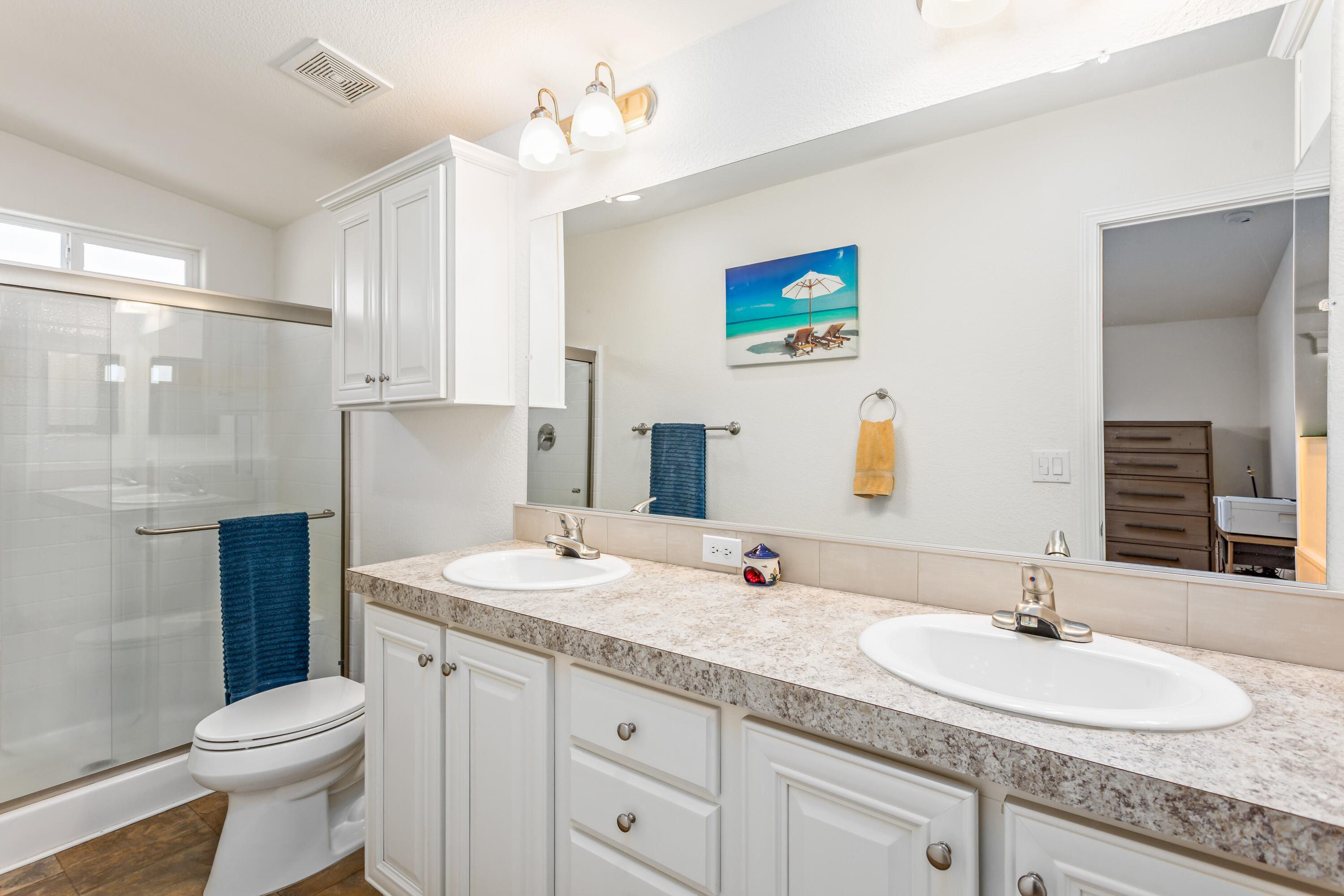 333 Old Mill Road, Unit SPC 66 Santa Barbara, CA 93110 - Photo 14 of 33 a bathroom with a granite countertop sink a toilet and a mirror