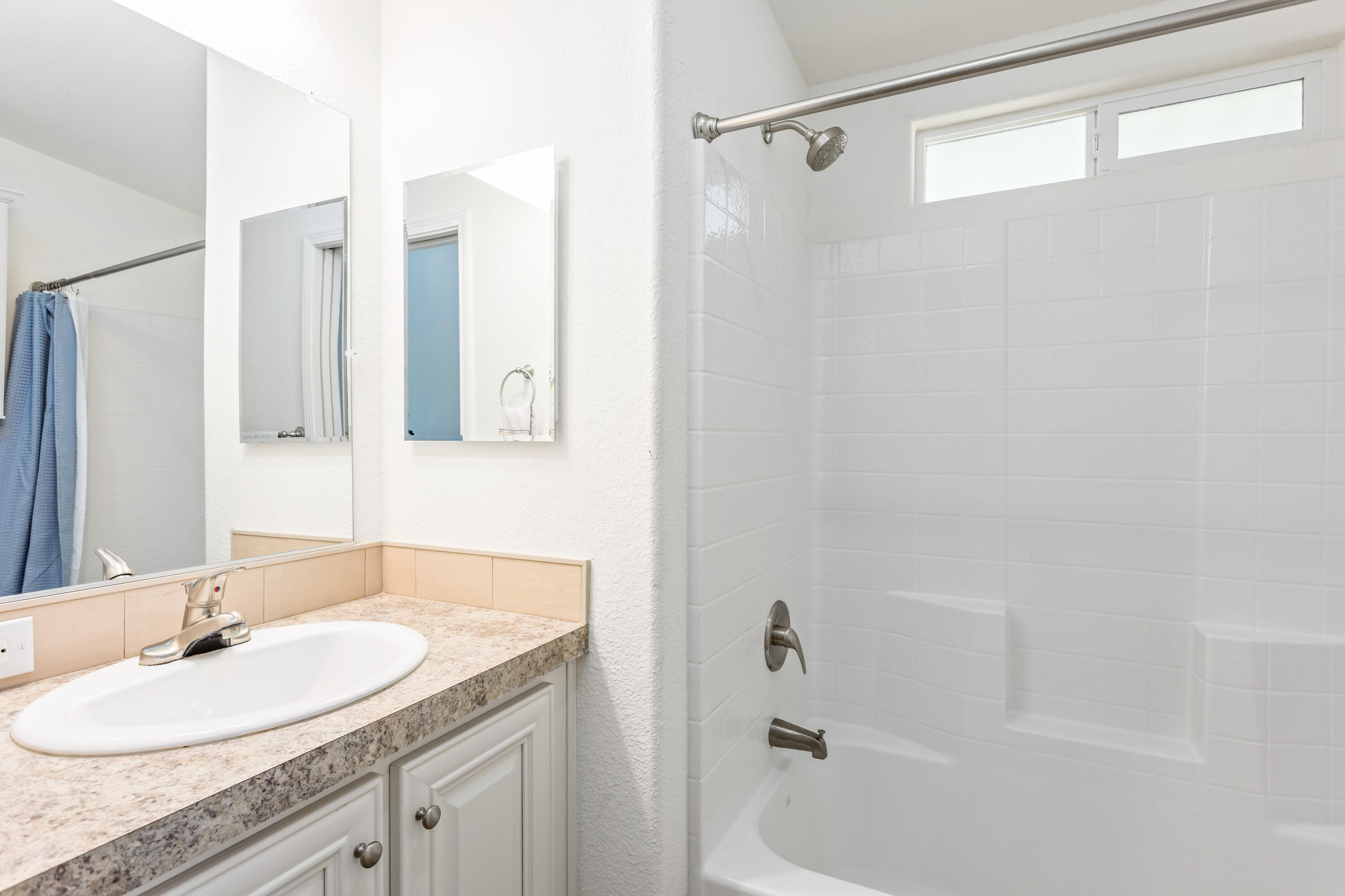 333 Old Mill Road, Unit SPC 66 Santa Barbara, CA 93110 - Photo 16 of 33 a bathroom with a granite countertop sink and a mirror