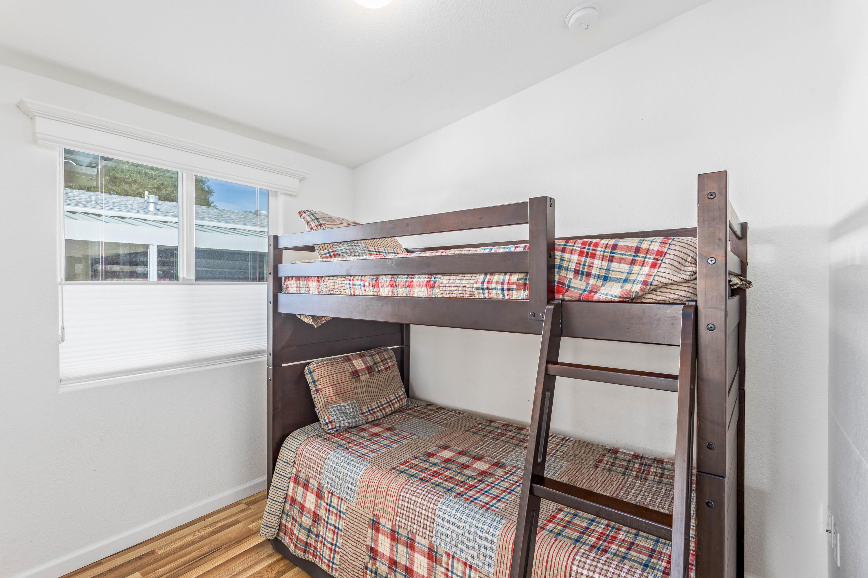 333 Old Mill Road, Unit SPC 66 Santa Barbara, CA 93110 - Photo 17 of 33 a bedroom with a bed and a window