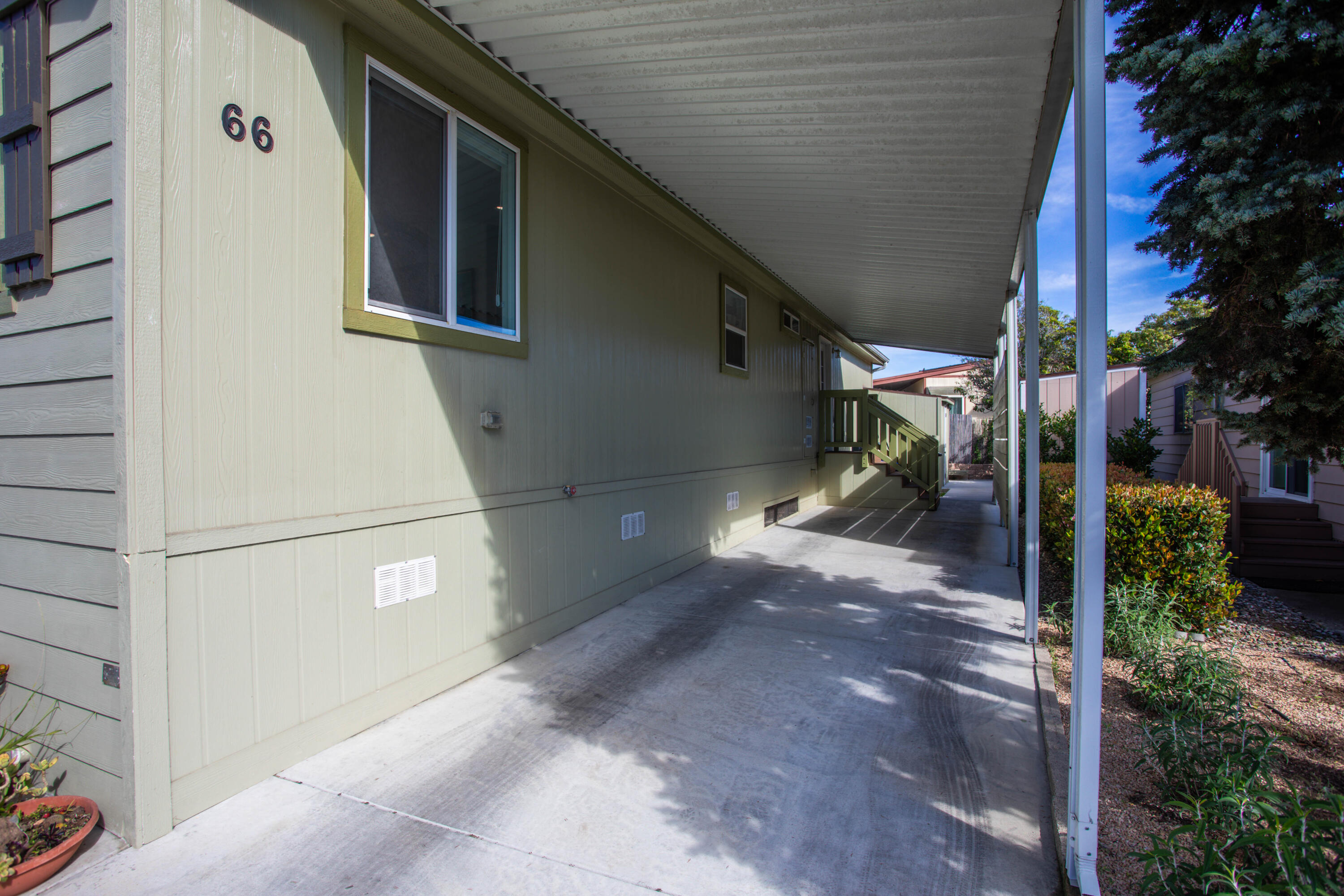 333 Old Mill Road, Unit SPC 66 Santa Barbara, CA 93110 - Photo 22 of 33 a view of a house with a backyard