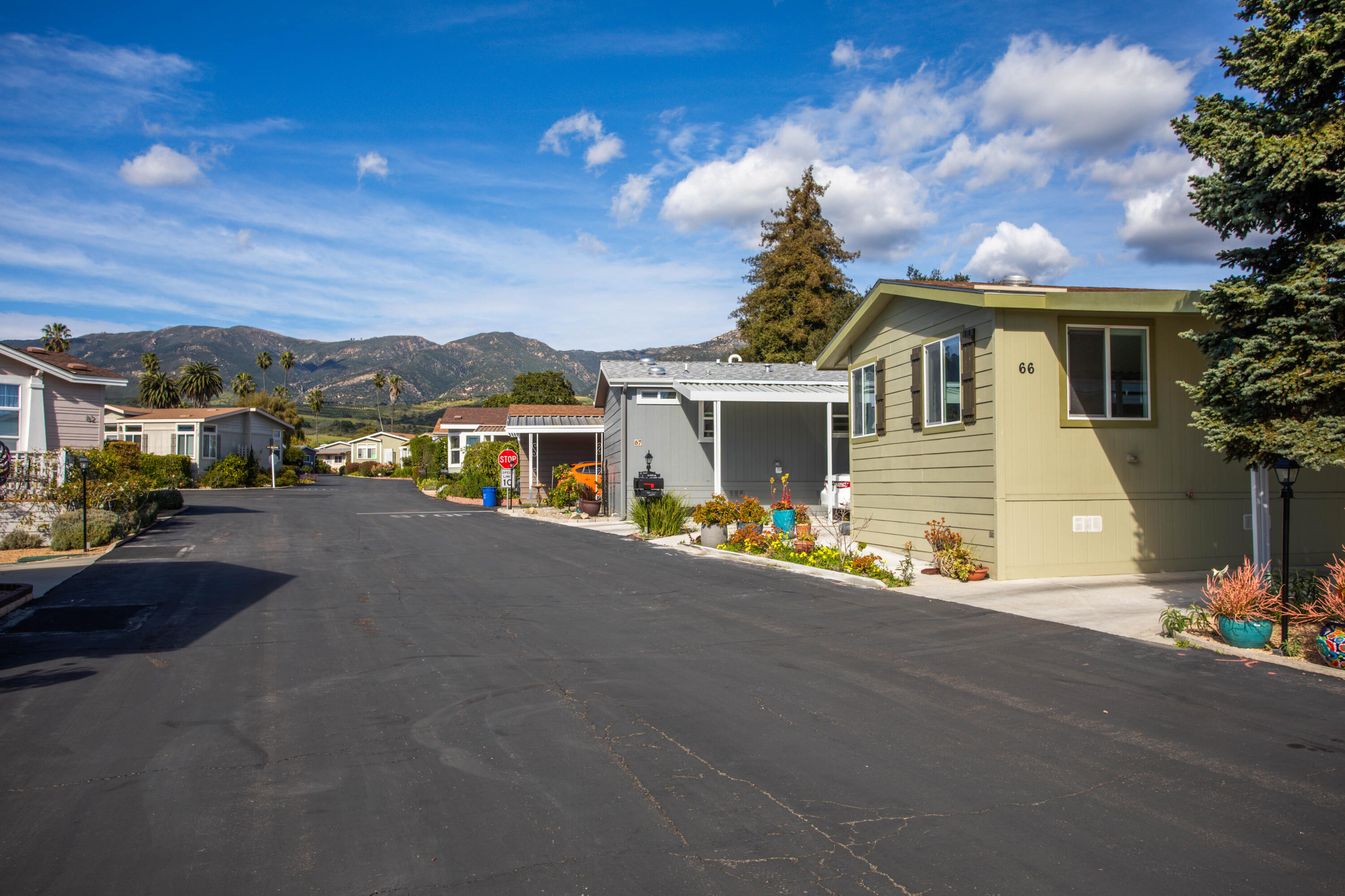333 Old Mill Road, Unit SPC 66 Santa Barbara, CA 93110 - Photo 23 of 33 a view of a white house with a street