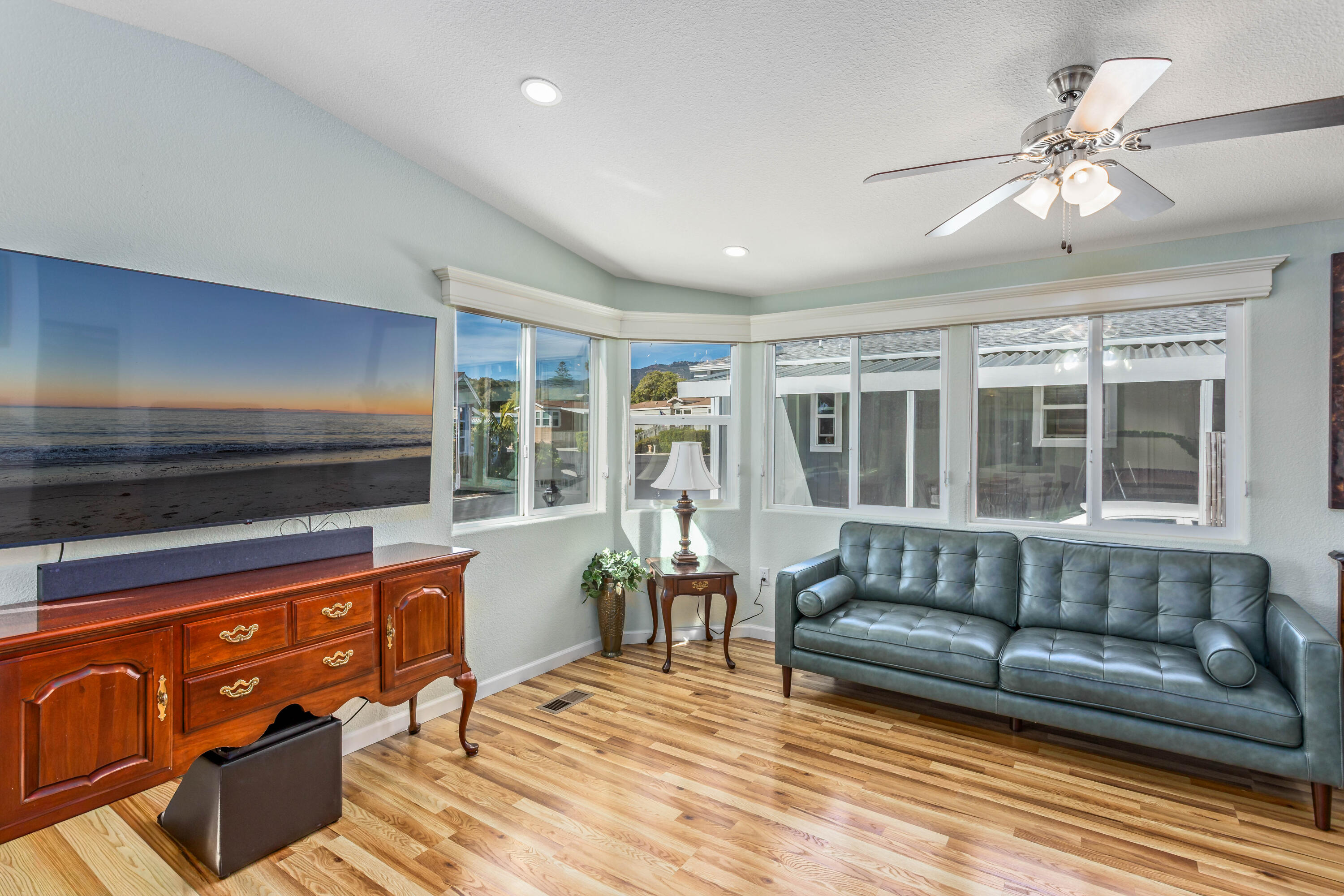 333 Old Mill Road, Unit SPC 66 Santa Barbara, CA 93110 - Photo 4 of 33 a living room with furniture and a flat screen tv