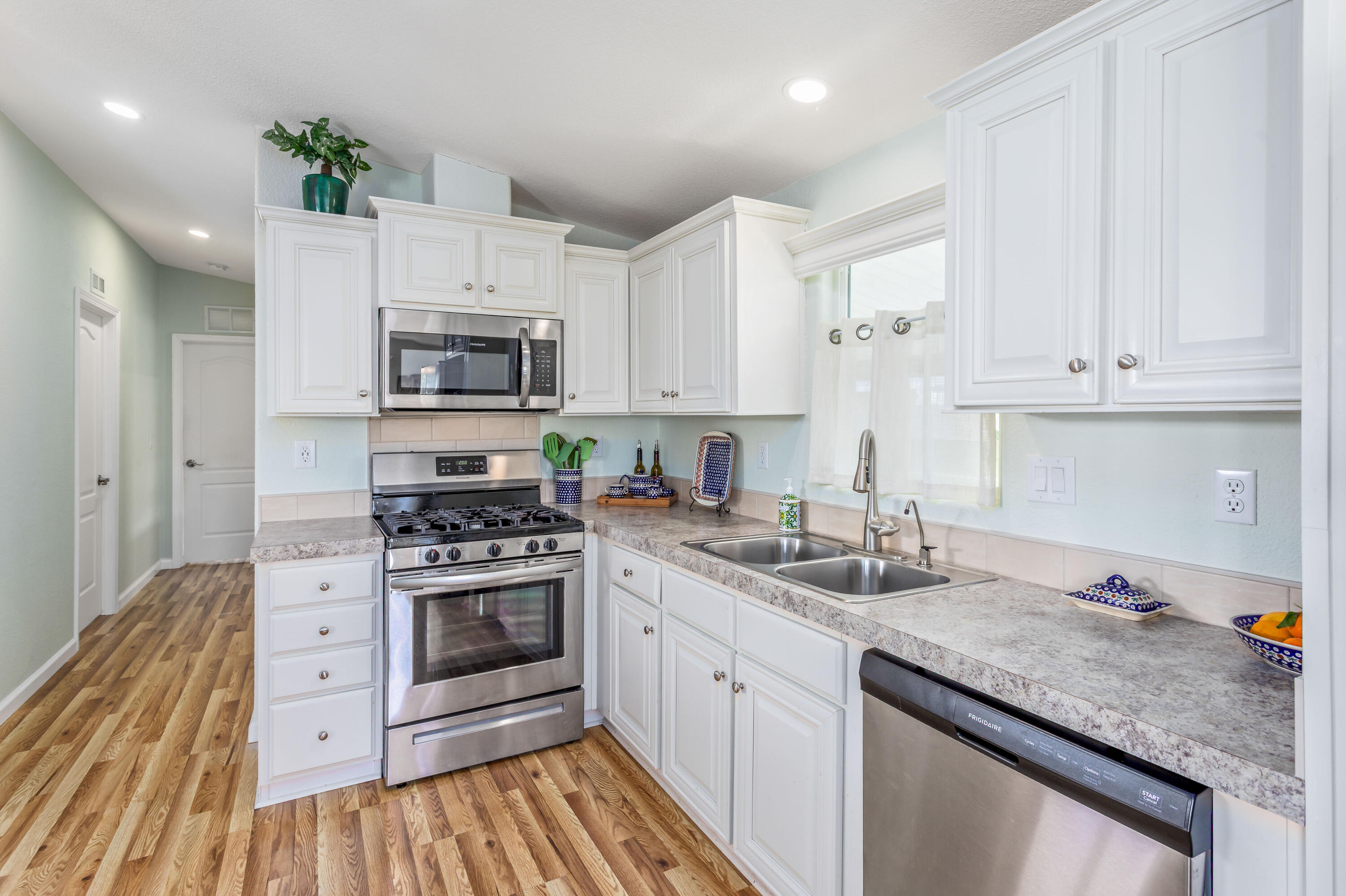 333 Old Mill Road, Unit SPC 66 Santa Barbara, CA 93110 - Photo 8 of 33 a kitchen with granite countertop a sink stainless steel appliances and cabinets